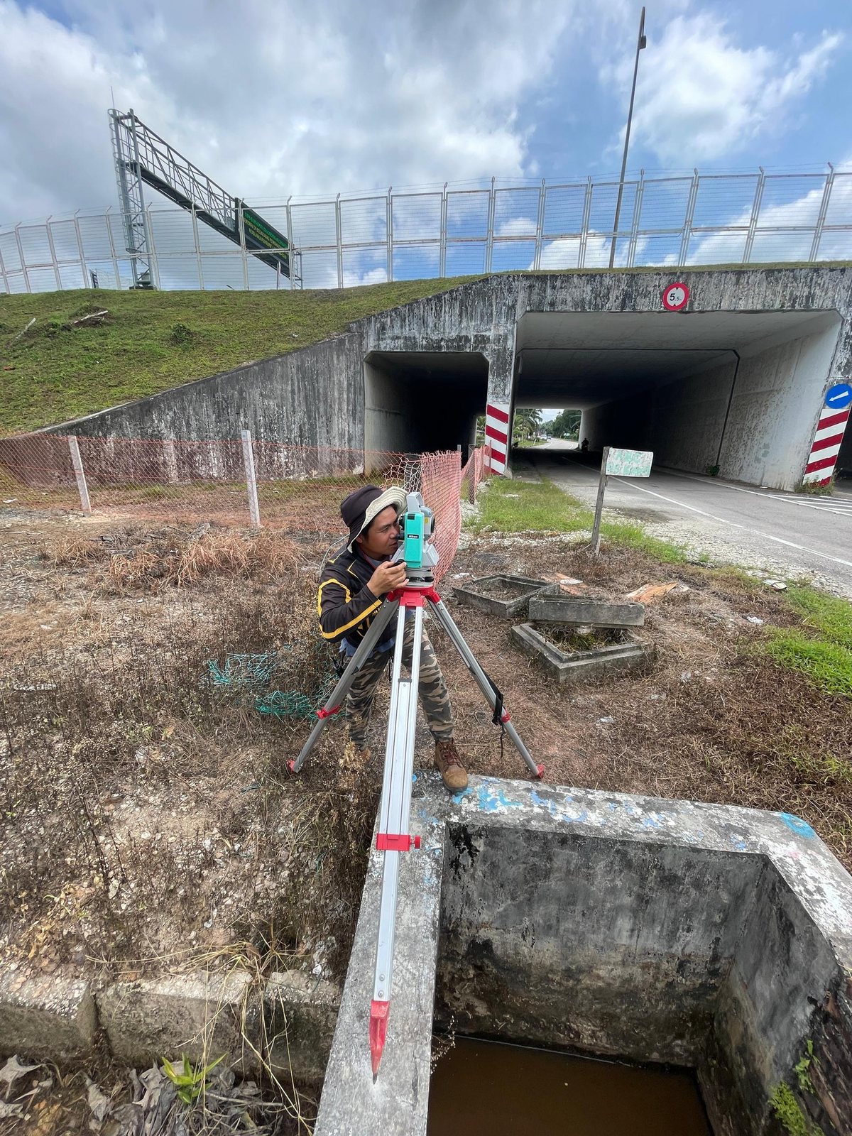Boundary survey at a highway culvert